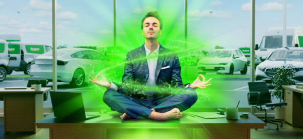 Fleet manager on desk in calm pose