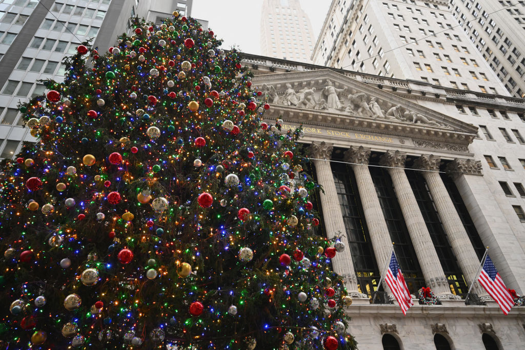 The NYSE building with a Christmas tree in the foreground